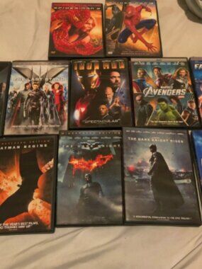 Batman , Avengers, Fantastic 4 , Iron Man 12 DVDs